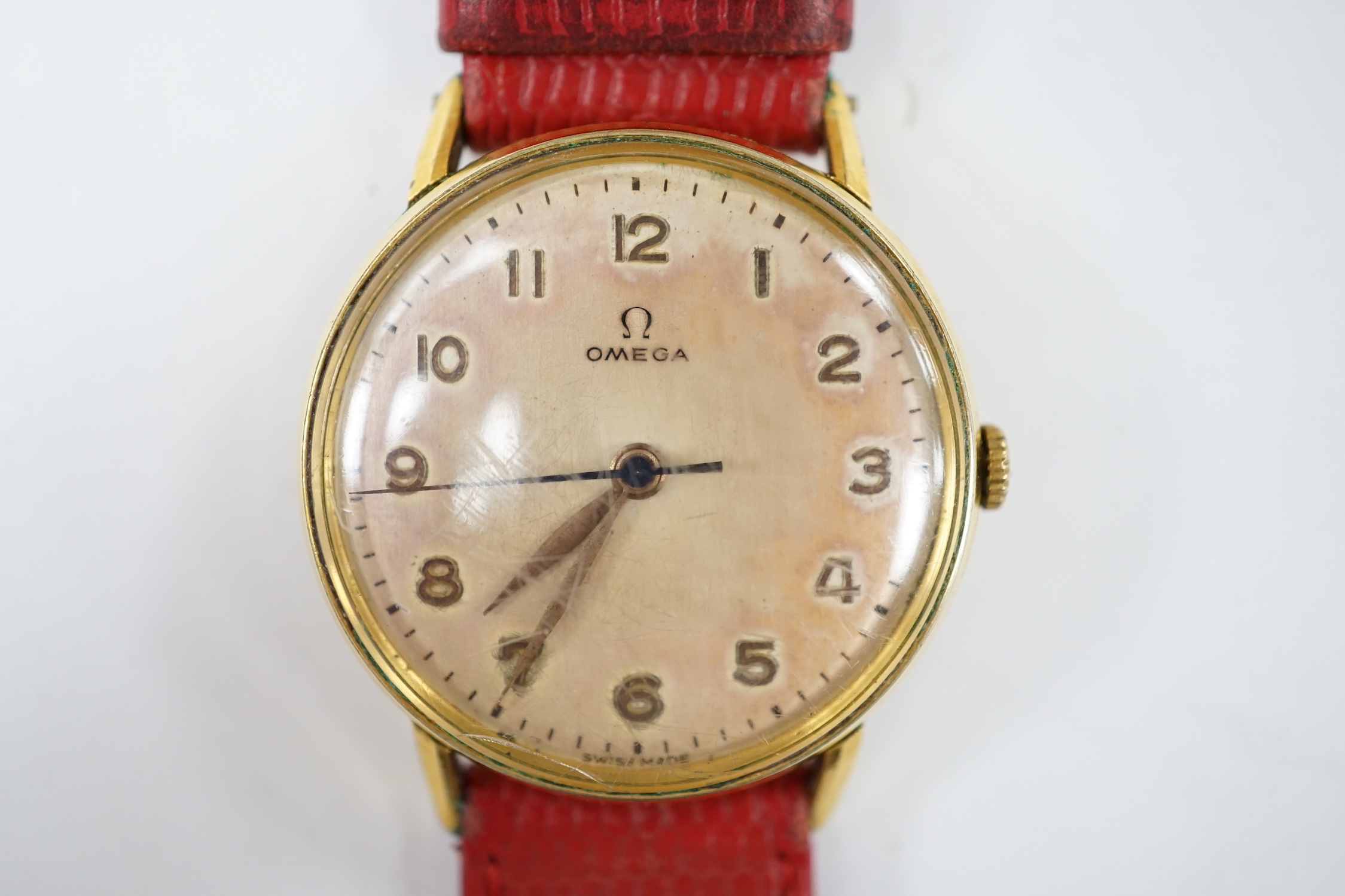 A gentleman's late 1940's gold plated Omega manual wind wrist watch, on associated leather strap, case diameter 32mm, no box or papers.